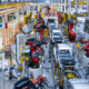 Assembly line production of new car. Automated welding of car body on production line. robotic arm on car production line is working